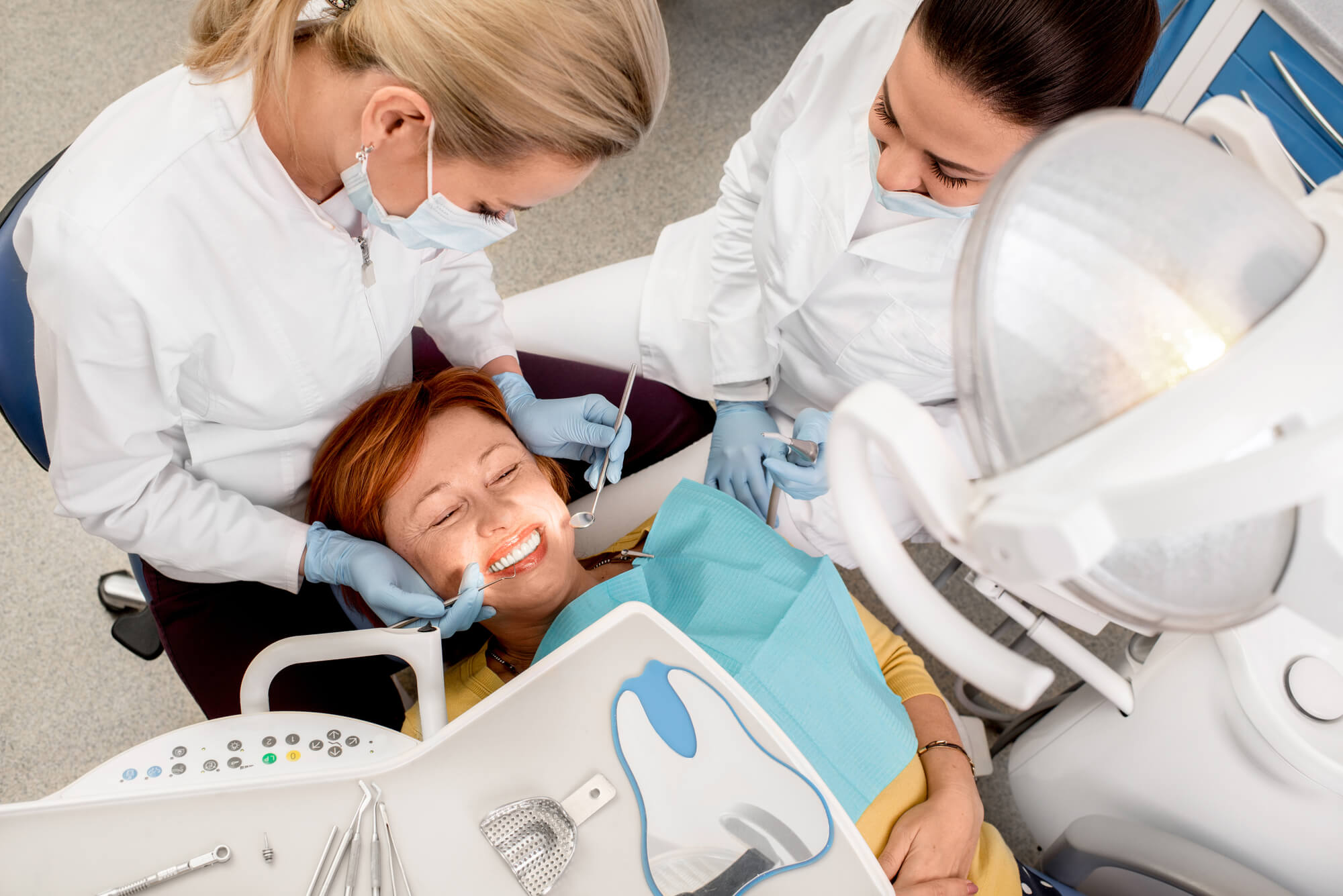 646c5c0f162d378c443f38c9 a woman getting Dental Implants in Englewood CO