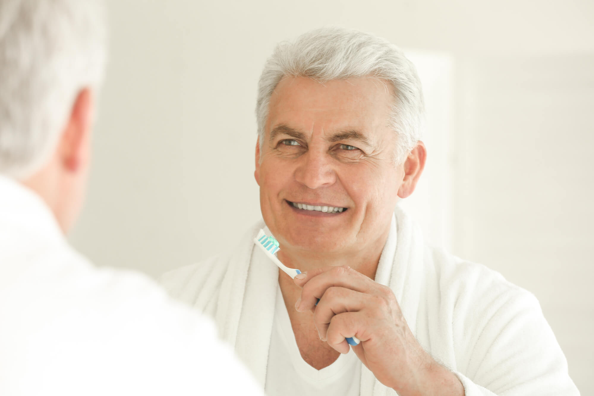 65b3239bee9acc2082f912ee brushing Dental Implants in Englewood CO