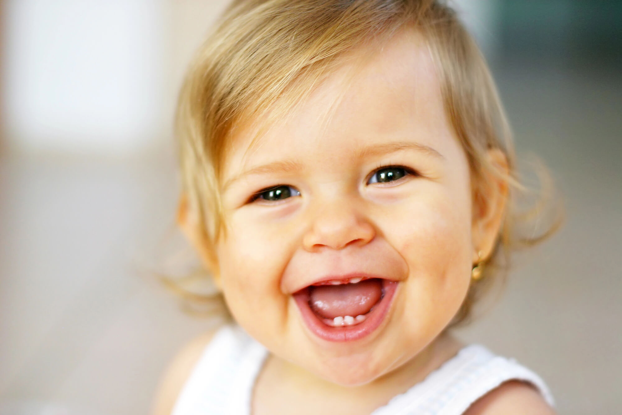 662138e61e9ca2cf67d0efda a baby smiling at the Family Dentist in Cherry Hills CO
