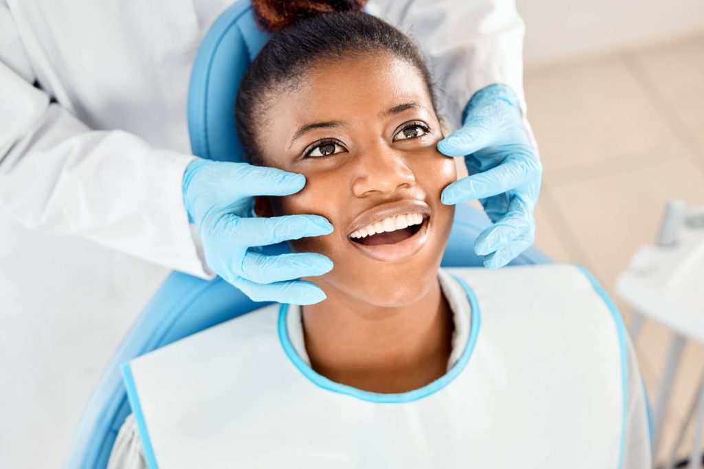 6797e3eb207391ffe516e6db teen at the Dentist in Englewood CO